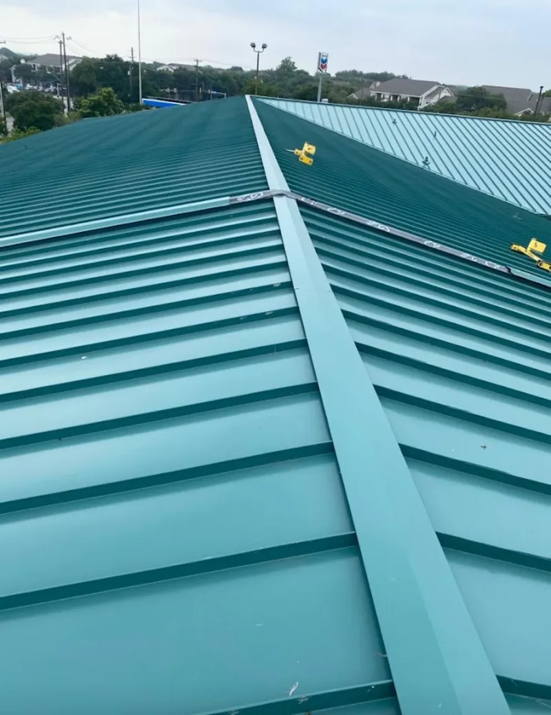 Green commercial metal roof ridge and valley for Metal Roof Repair in Folsom
